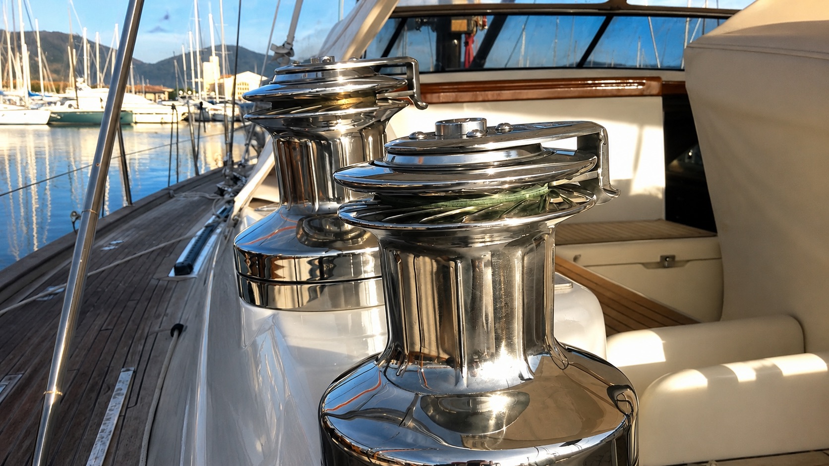 Polished stainless-steel deck winches aboard a superyacht.